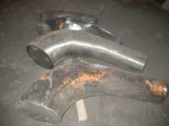 Hot forming elbow mandrel by casting