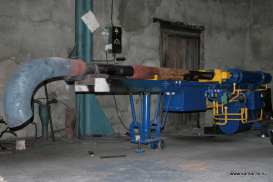 Elbow hot forming machine with mandrel